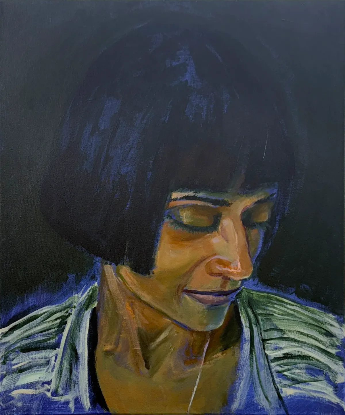 A portrait of a woman head bowed, with a black bob haircut