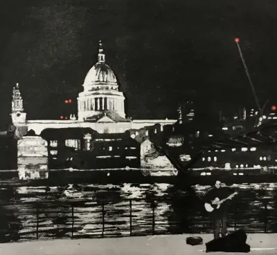 St Paul's Cathedral and the Millennium Bridge at night, seen from the Members' viewing balcony at Tate Modern